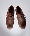 Peletería humana. Zapatos de hombre, anos